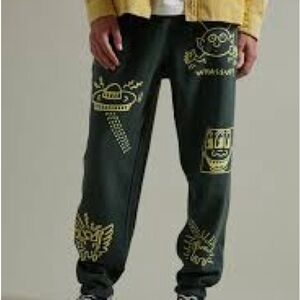 Urban Outfitters Keith Haring Green Graphic Sweatpants with Yellow Designs
